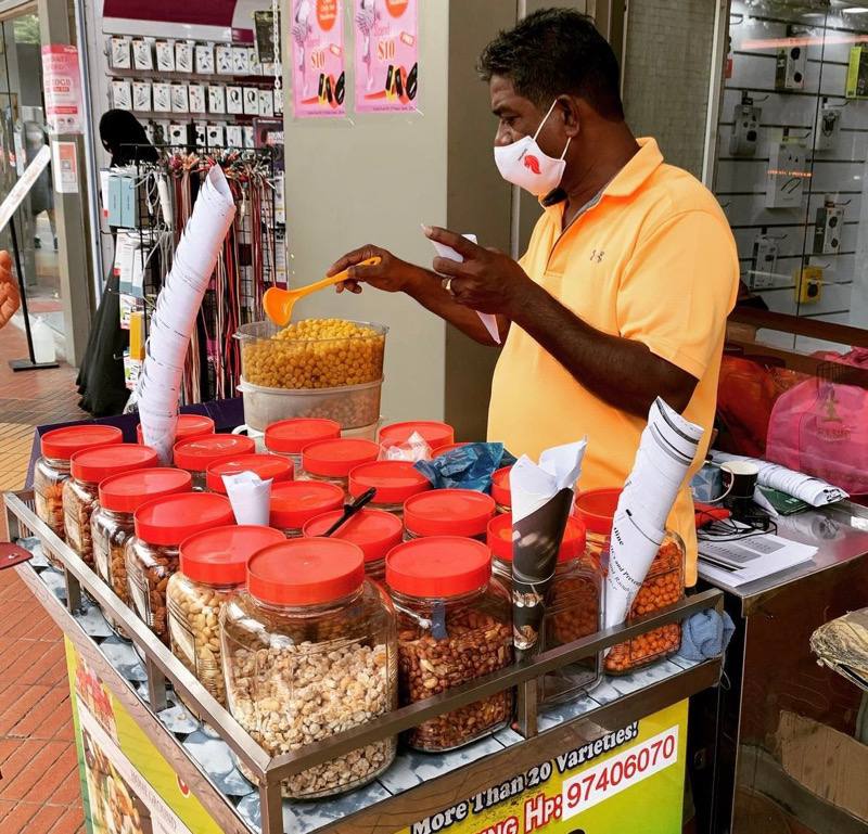 last kacang puteh man dhoby ghaut peace centre singapore