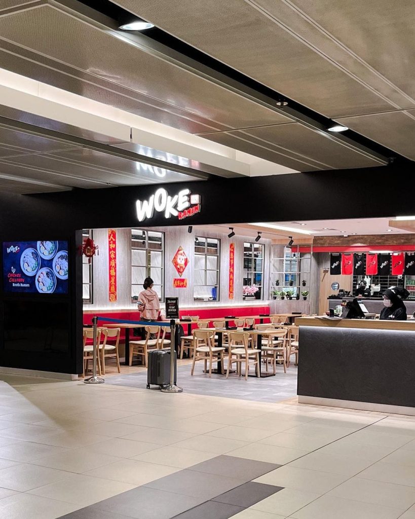 Slurp up some delicious Chinese-Japanese fusion ramen store Woke Ramen at Changi Airport while watching the planes fly by.