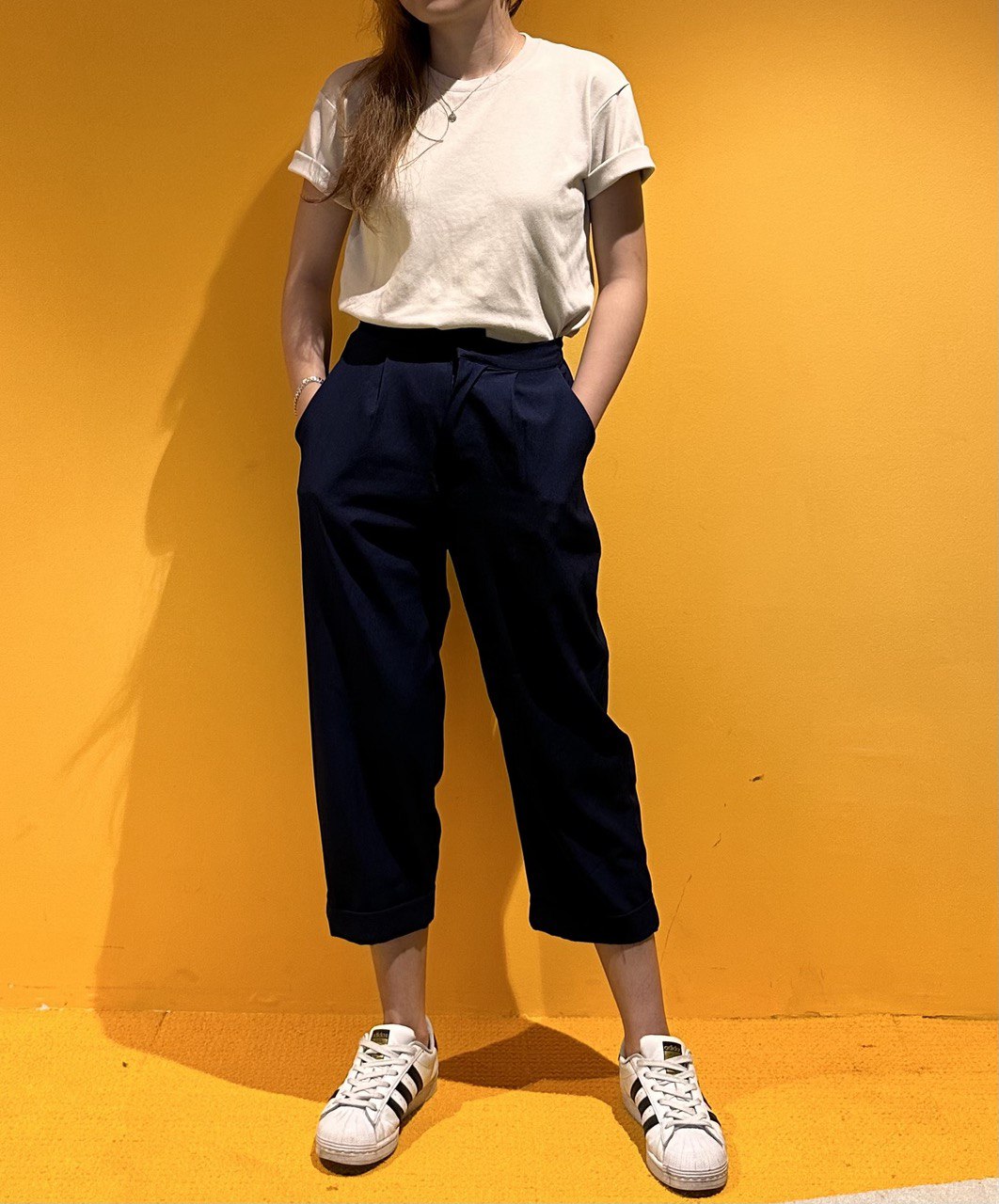 capsule wardrobe plain tee and tailored trousers